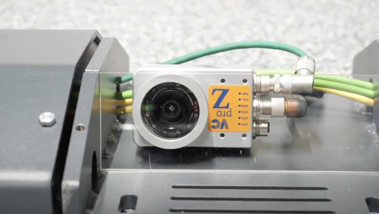 A small camera sits in the Coats tread depth scanner and is protected by a glass-like barrier