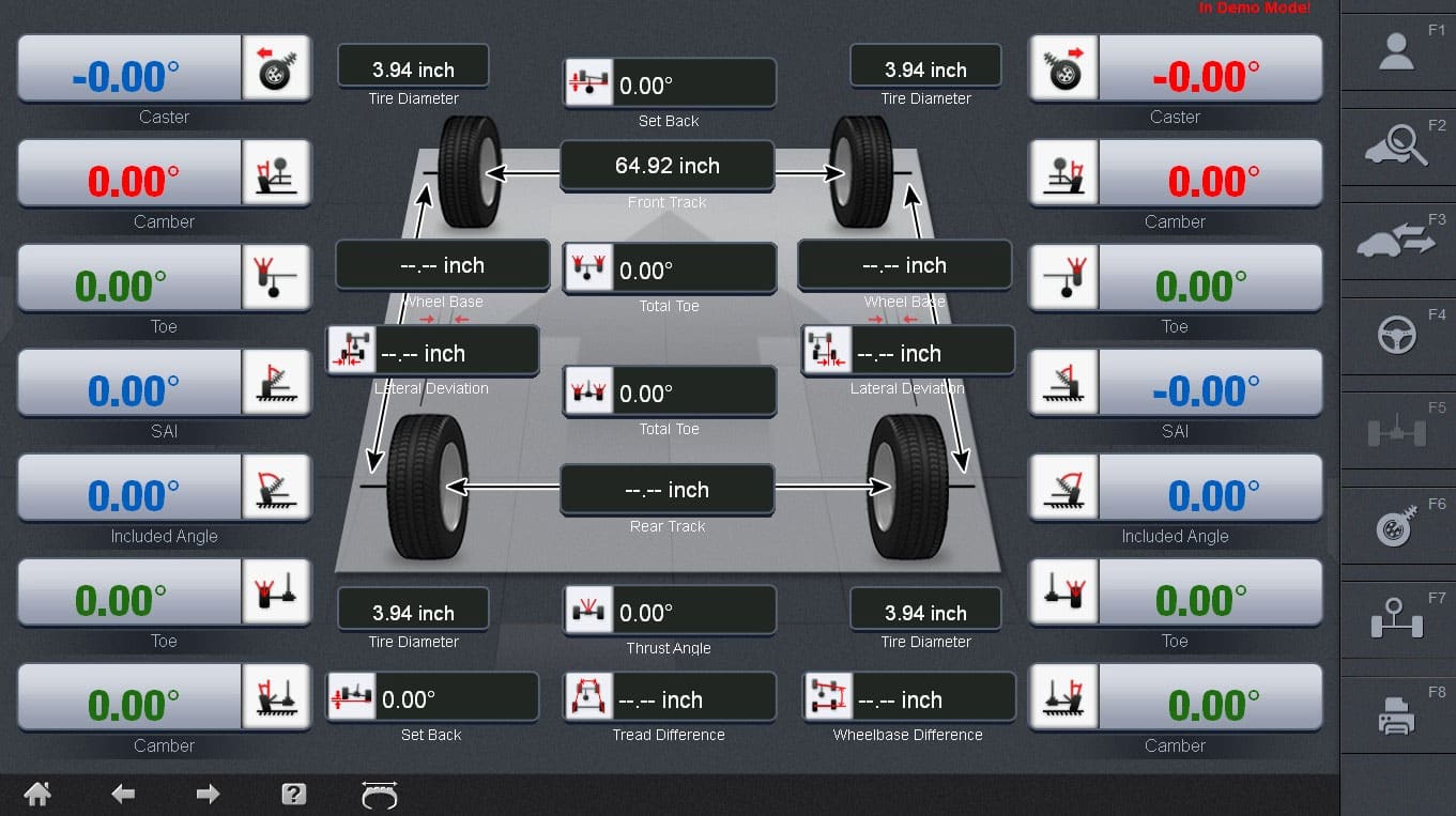 A screenshot of the desktop monitor shows all measurements and advanced diagnostics of the car being serviced with a diagram of the cars wheels in the center of the screen