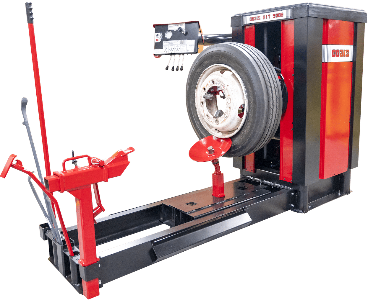 A red and black heavy duty tire changer with a large tire mounted