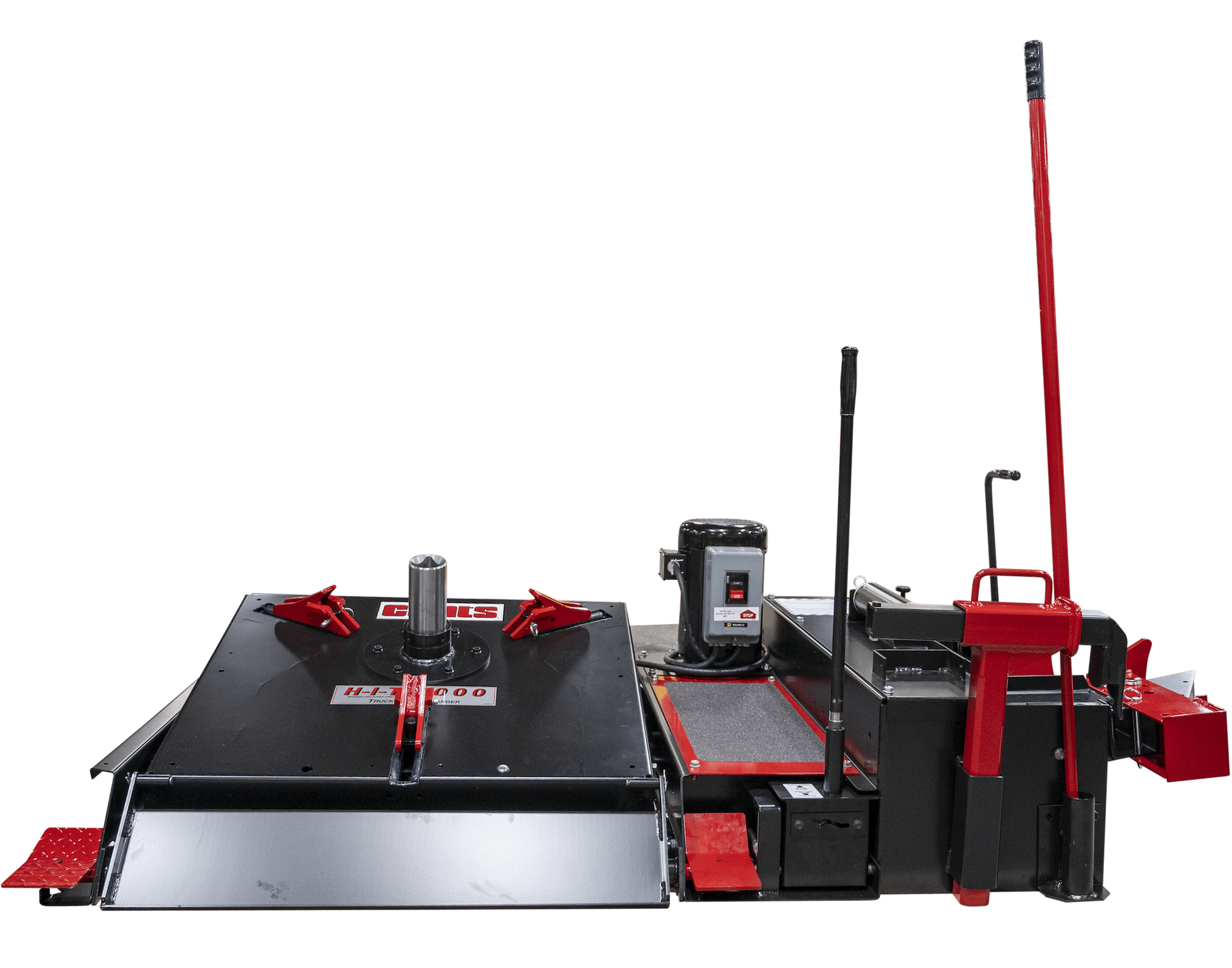 A red and black heavy duty tire changer that is low to the ground