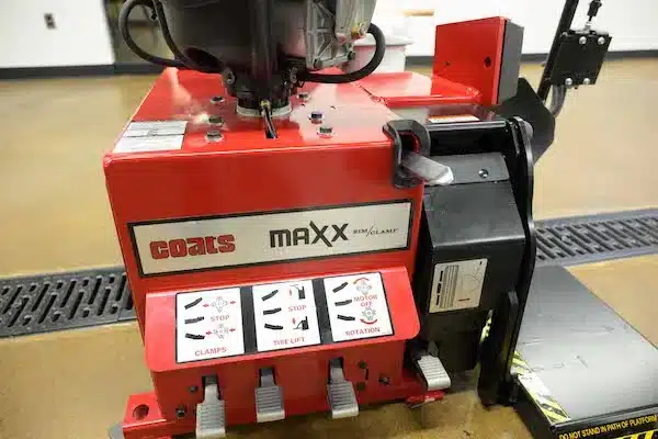 Coats red Maxx 80 tire changer chassis with pedals and tire lift