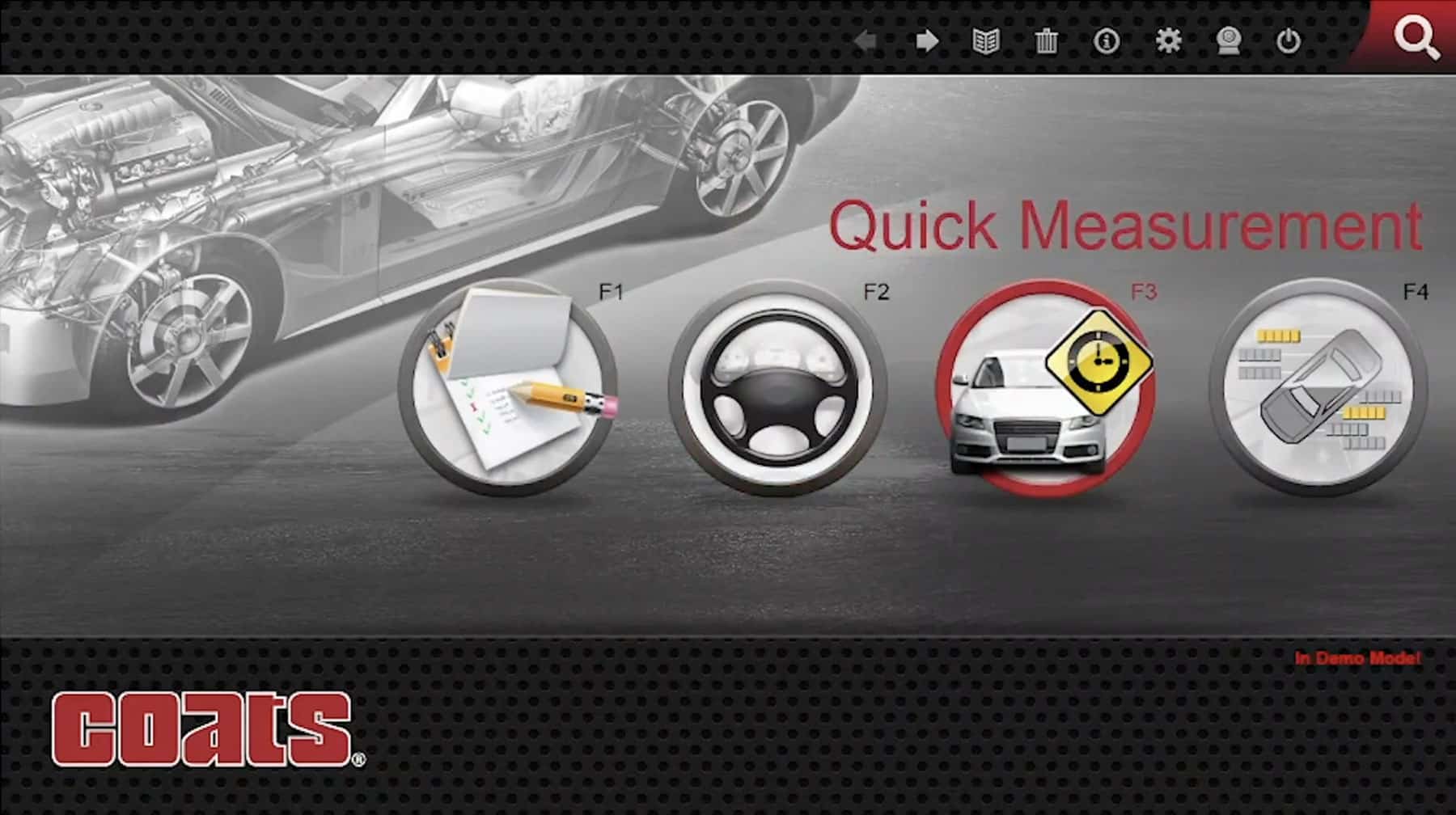 The desktop monitor of the Coats wheel aligner shows the main menu selection with “Quick Measurement” as the highlighted, selected mode