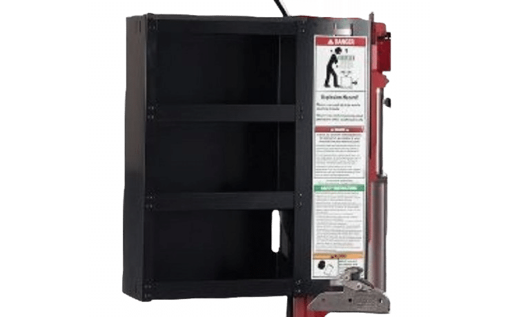 Black box with compartments attached to the main, back tower of Coats rim clamp tire changers