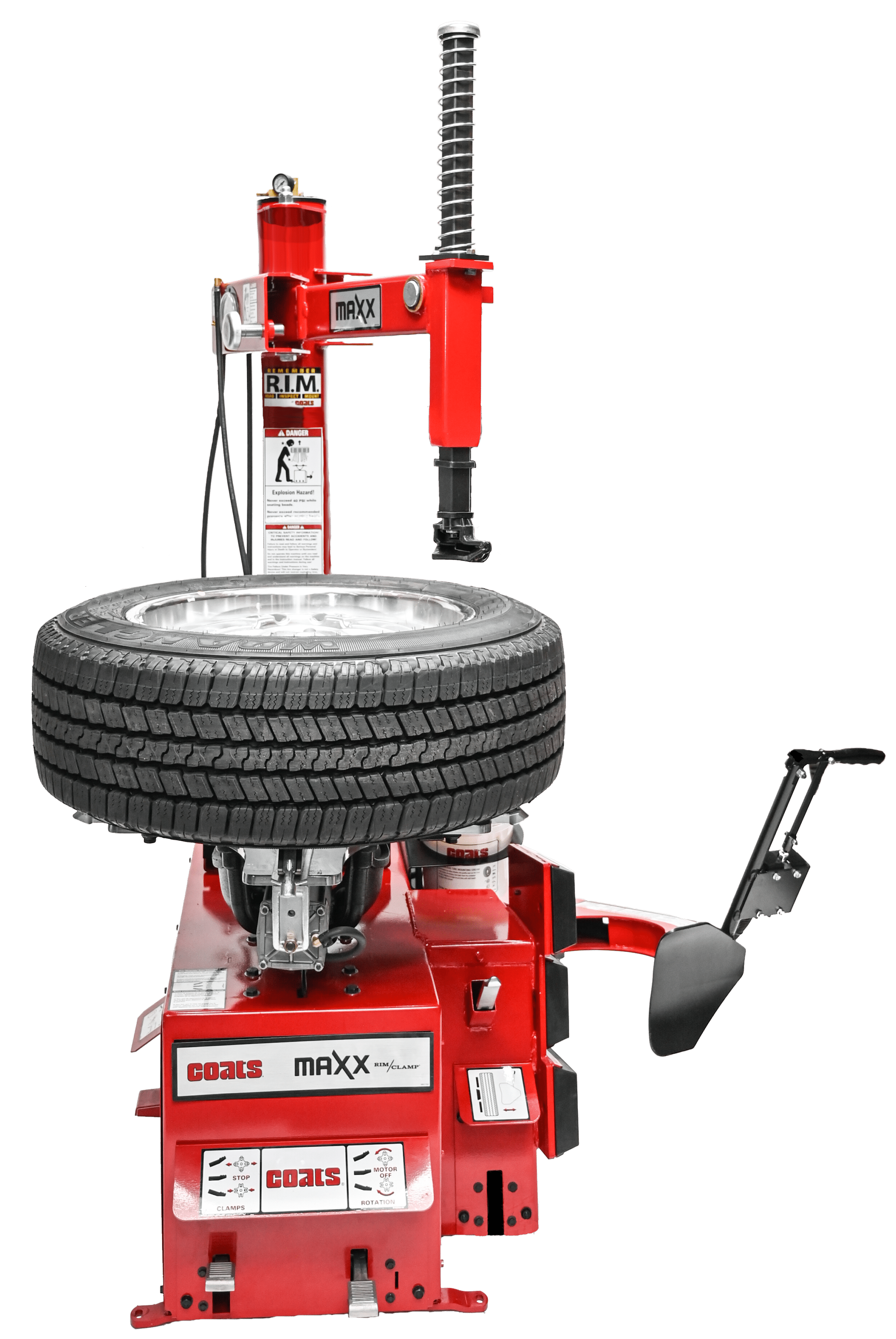 A red colored Coats Maxx 50 tire changer with a wheel mounted on the tabletop