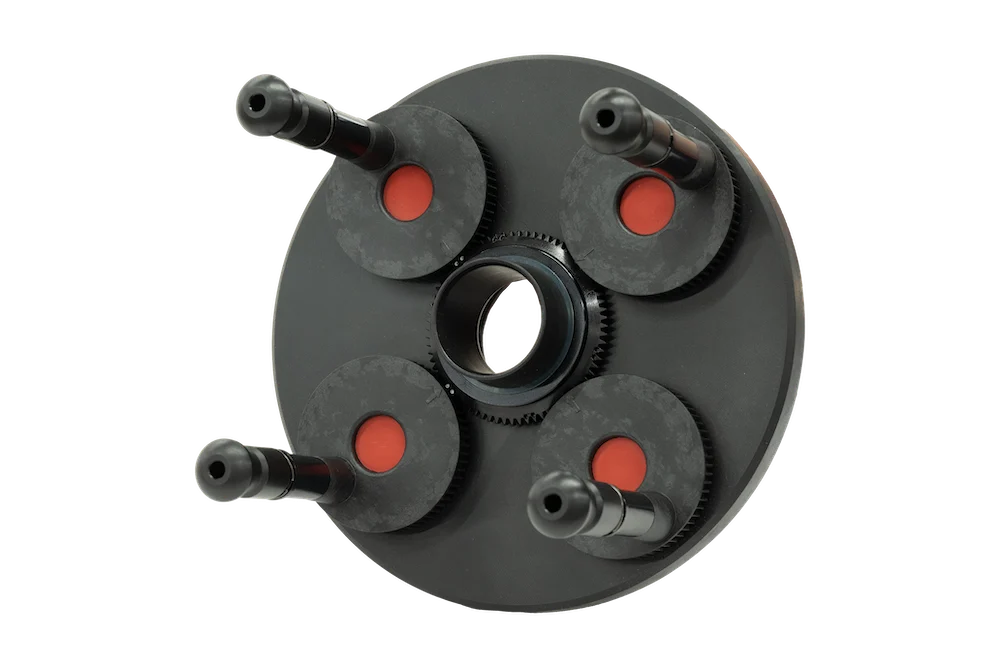 circular, black, wheel balancer pin plate with 4 pins for 4 lug wheels