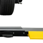 black and yellow Coats 525 wheel balancer lift attached to a Coats wheel balancer
